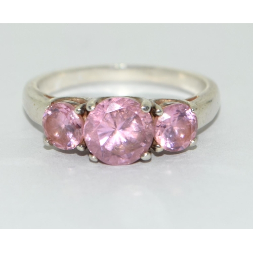 184 - A 925 silver and pink topaz trilogy ring Size P