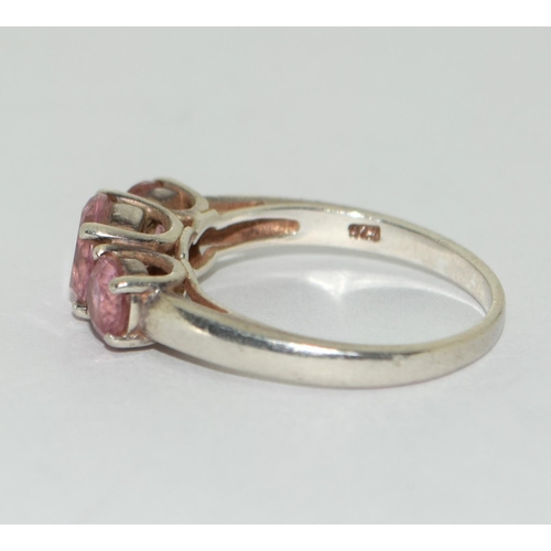 184 - A 925 silver and pink topaz trilogy ring Size P