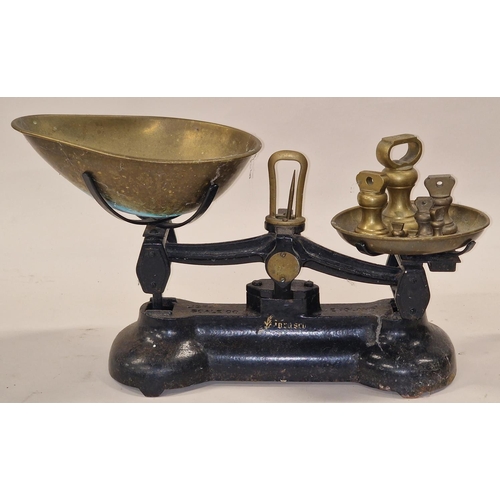 20 - Vintage cast metal set of sweet shop weighing scales to include brass weights.