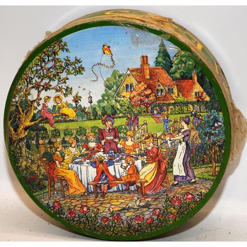 14 - Huntley & Palmer Garden Party naughty biscuit tin. Rare sealed with contents intact example