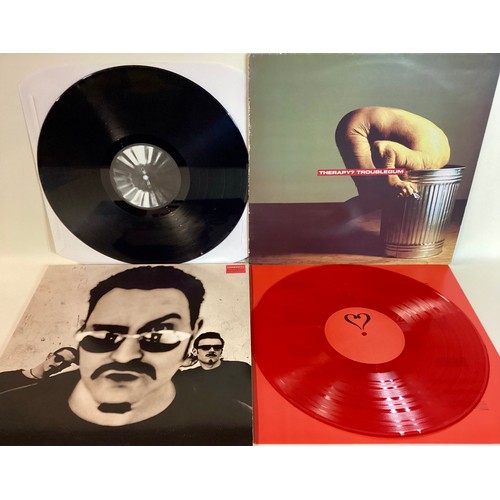 62 - THERAPY VINYL ALBUMS X 2. We have a copy here of ‘Infernal Love’ pressed on Red vinyl followed by a ... 