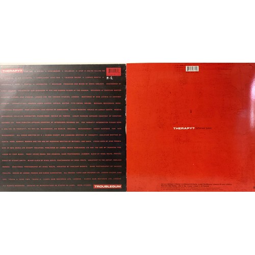 62 - THERAPY VINYL ALBUMS X 2. We have a copy here of ‘Infernal Love’ pressed on Red vinyl followed by a ... 
