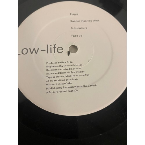 66 - NEW ORDER LOW LIFE LP WITH ONION SKIN PAPER OUTER. Found here on Factory Records FACT 100 from 1985.... 