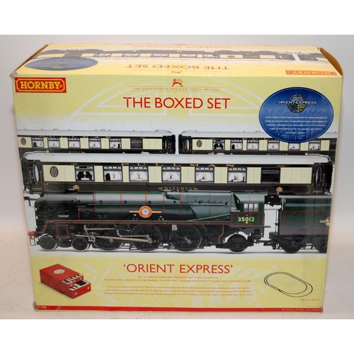 130 - Hornby OO gauge Orient Express - The Boxed Set. Premier electric train set ref:R1038. Boxed.