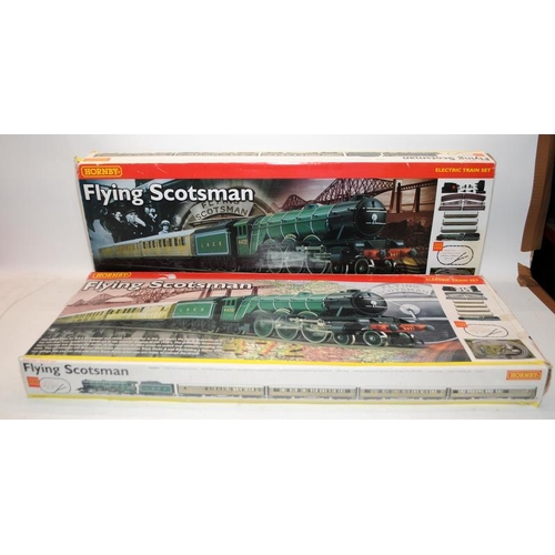 135 - Hornby OO gauge 2 x boxed Flying Scotsman Train sets, R1019 and R1039. Both boxed but incomplete, on... 