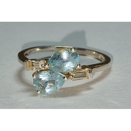 391 - A 925 silver , Cz and light blue stone ring, Size P