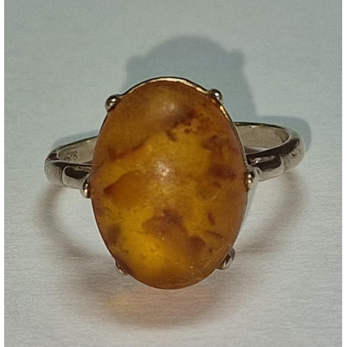 392 - A 925 silver and unpolished amber ring Size Q