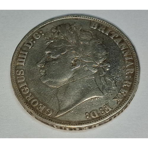 390 - A George III 1828 silver crown.