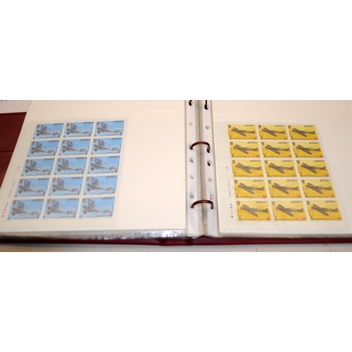 198 - 5 x albums mostly Jersey stamps mint stock sheets (one album near empty)