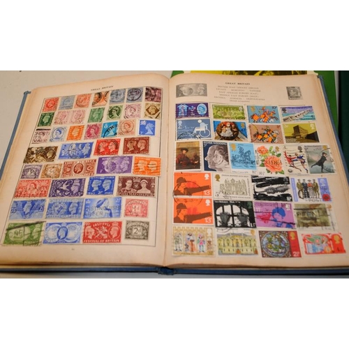 204 - A number of vintage schoolboy stamp albums with a good selection of world stamps