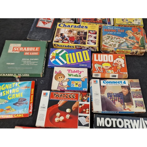 268 - A large collection of Vintage games, not checked for completeness.