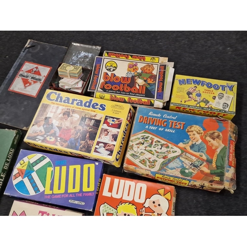 268 - A large collection of Vintage games, not checked for completeness.