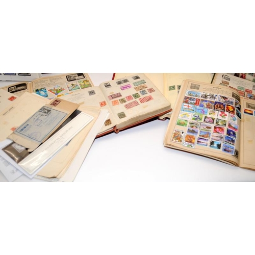 214 - Quantity of Stamp albums and stock books from around the world plus loose stamps to sort. Part of a ... 