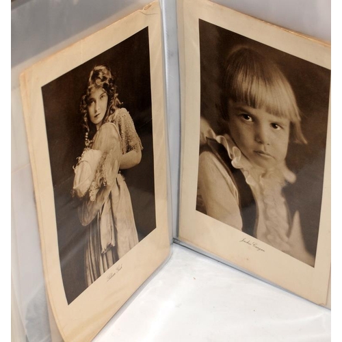 227 - Black folder containing a large number of film studio stills and publicity photographs of many of th... 