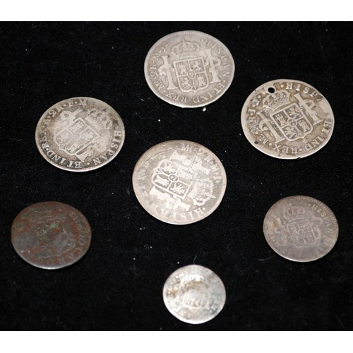 84 - A collection of early 18thC Spanish silver coins