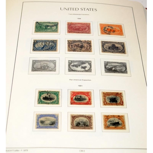 179 - Red Lighthouse album containing United States postage stamps, good level of completion through later... 