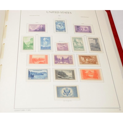 179 - Red Lighthouse album containing United States postage stamps, good level of completion through later... 