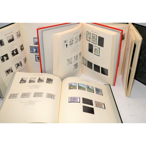 182 - 4 x Windsor GB stamps albums with illustrated pages c/w a Lighthouse stock book. A few stamps dotted... 