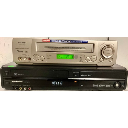 497 - 2 X VHS VIDEO PLAYERS. Here we have a Panasonic DMR-E749V combined VHS/DVD player and a Sharp VC-VH9... 