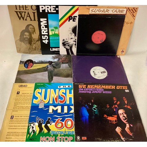 118 - COLLECTION OF REGGAE RELATED VINYL RECORDS. These records include artists - Peter Tosh - Bob Marley ... 