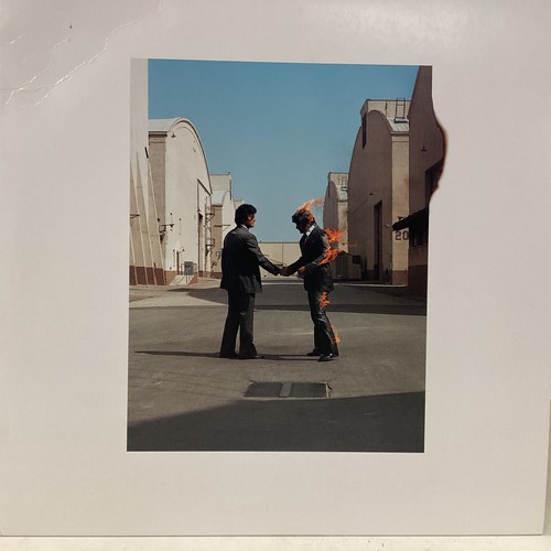 216 - PINK FLOYD ‘WISH YOU WERE HERE’ 2011 REISSUED VINYL. This is a Ex copy complete with poster and post... 