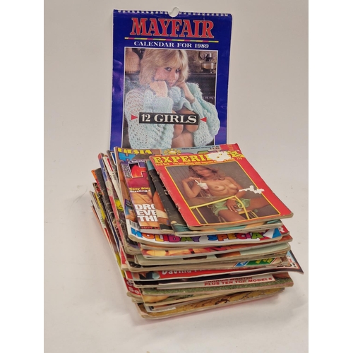 A collection of vintage adult magazines and a 1989 Mayfair