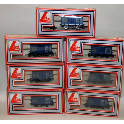 64 - Lima OO gauge rake of 7 Birds Custard Closed Wagons. All boxed