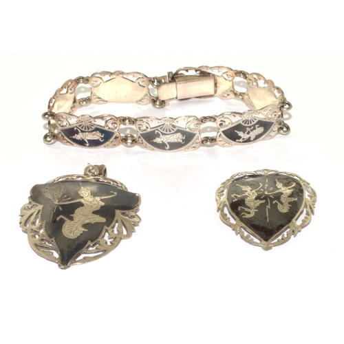 307 - Siamese silver bracelet pendant and brooch