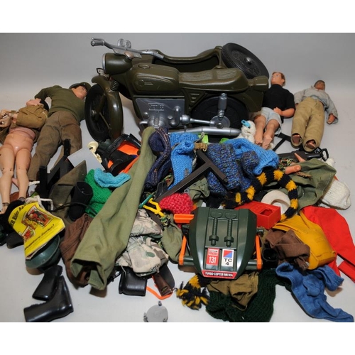 195 - A collection of vintage dolls including Action Man figures, vehicles and clothing