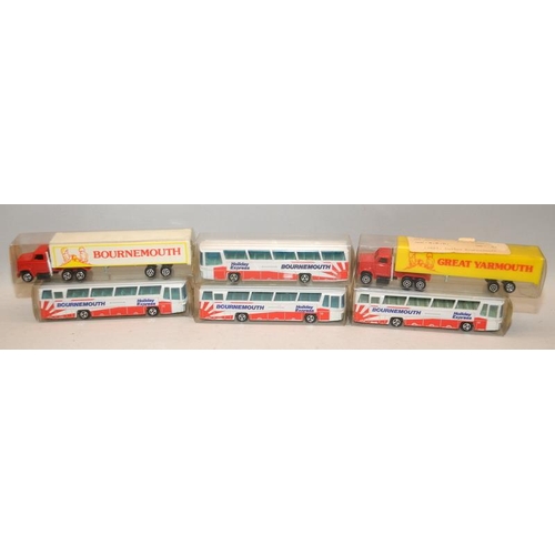 214 - A collection of die-cast buses and coaches. 15 in lot, all boxed