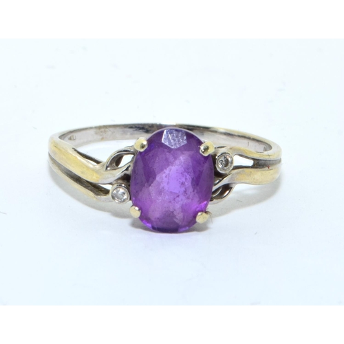 321 - 9ct white gold ladies Amethyst and diamond open work setting ring size S