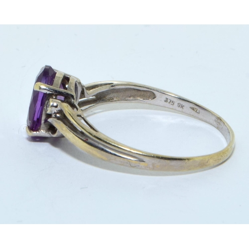 321 - 9ct white gold ladies Amethyst and diamond open work setting ring size S