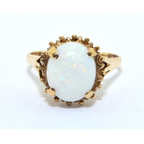 351 - 9ct gold ladies Opal claw set openwork ring 3.8g size S