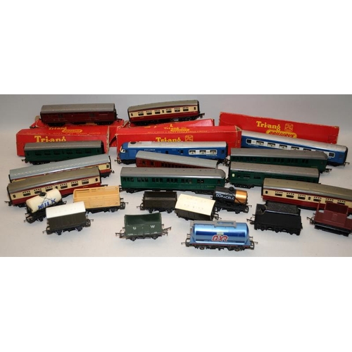 34 - A collection of OO gauge goods wagons and coaches, some boxed