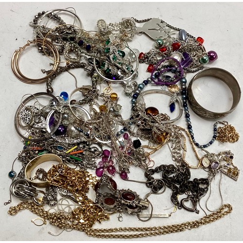 303 - Bag of costume Jewellery