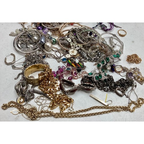 303 - Bag of costume Jewellery