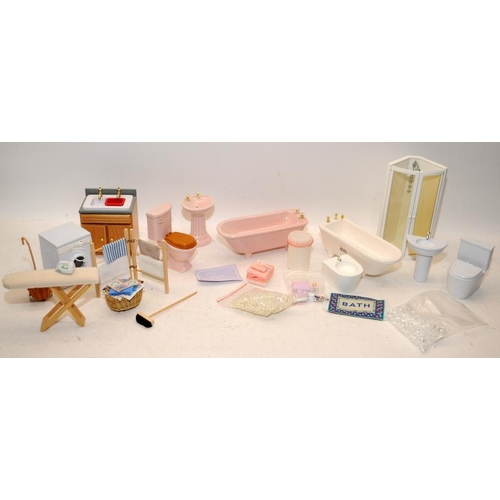 267 - Dolls House Furniture: A selection of bath/laundry room settings including a ceramic bathroom suite