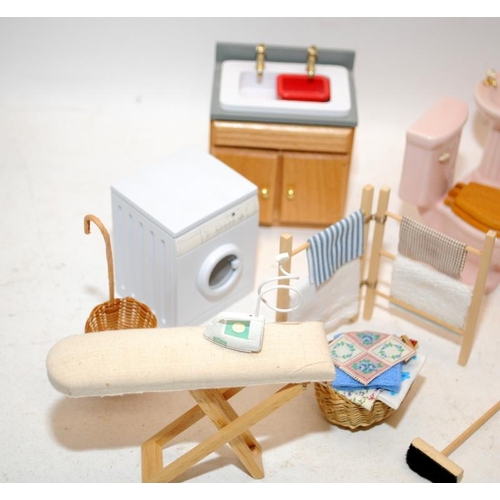 267 - Dolls House Furniture: A selection of bath/laundry room settings including a ceramic bathroom suite