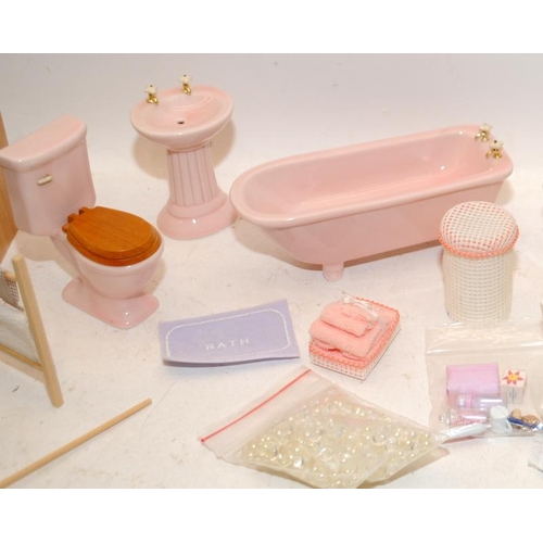 267 - Dolls House Furniture: A selection of bath/laundry room settings including a ceramic bathroom suite