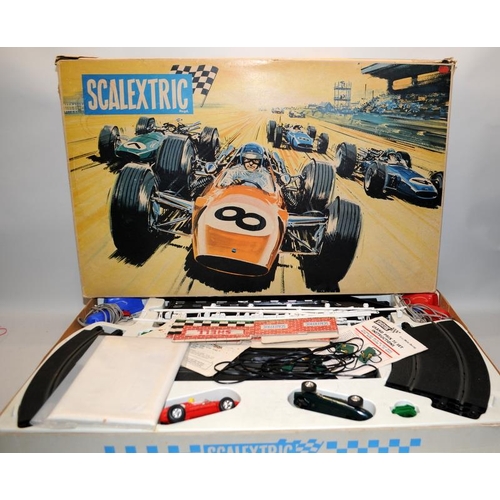 191 - Vintage Scalextric Grand Prix 75 slot car racing set. The most expensive set available in its day, b... 