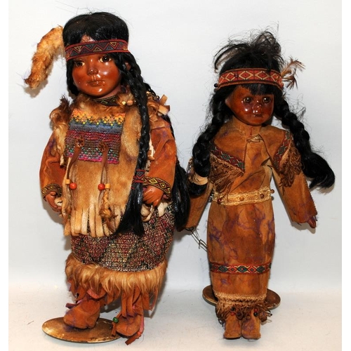 266 - Two vintage dolls in Native American Indian dress approx 40cms tall