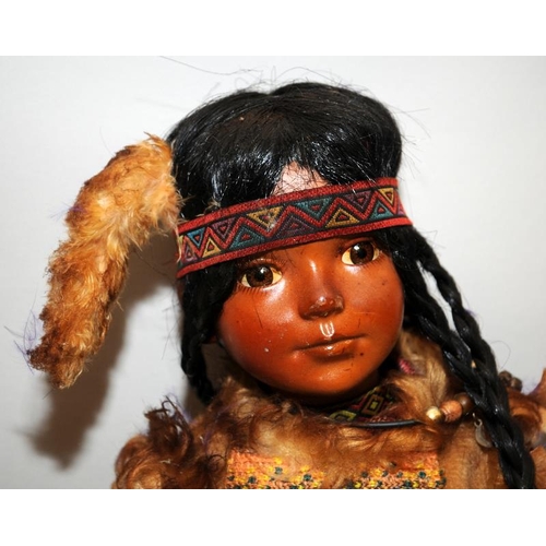 266 - Two vintage dolls in Native American Indian dress approx 40cms tall