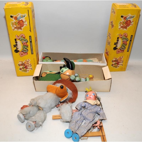 276 - Four vintage Pelham Puppets to include boxed Baby Dragon and Caterpillar, and unboxed Orinoco Womble... 