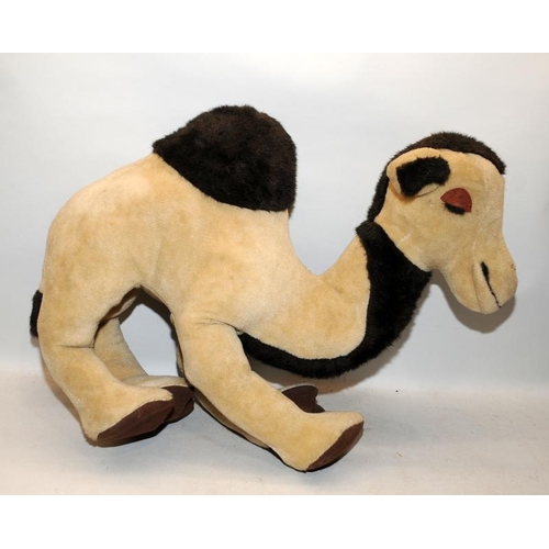 284 - Large vintage Merrythought hump backed camel. Label to underside of foot. Approx 75cms across