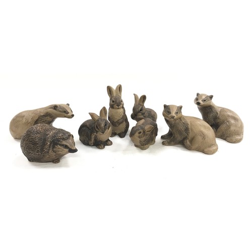 104 - Poole Pottery collection of stoneware animals to include badgers, Hedgehog & rabbits (8)