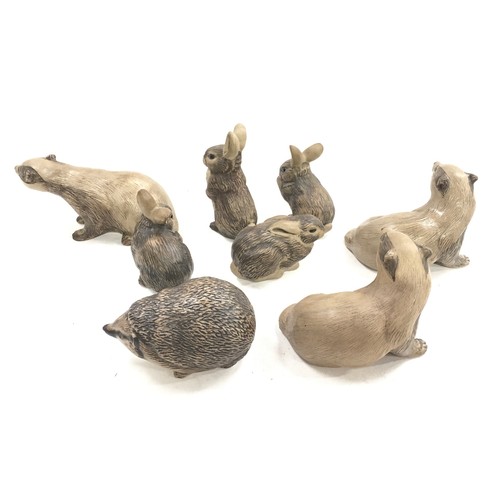 104 - Poole Pottery collection of stoneware animals to include badgers, Hedgehog & rabbits (8)