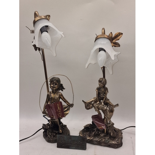 3 - Pair of De Caprio bronzed effect vintage resin table lamps depicting children. Both include glass sh... 