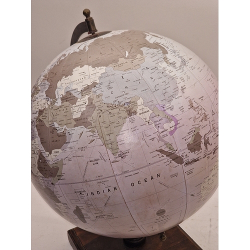 5 - Large rotating globe of the world on wooden base 48cm tall.