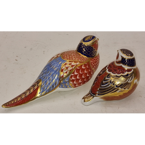 81 - Two Royal Crown Derby paperweights to include Pheasant and Sparrow. Both with gold stoppers unboxed.