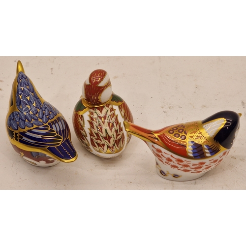 85 - Three Royal Crown Derby bird paperweights. All with gold stoppers unboxed.